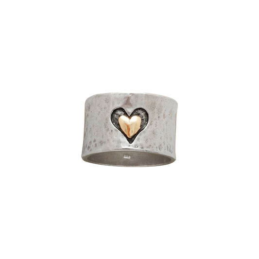 Silver ring with a heart-shaped design on a white background