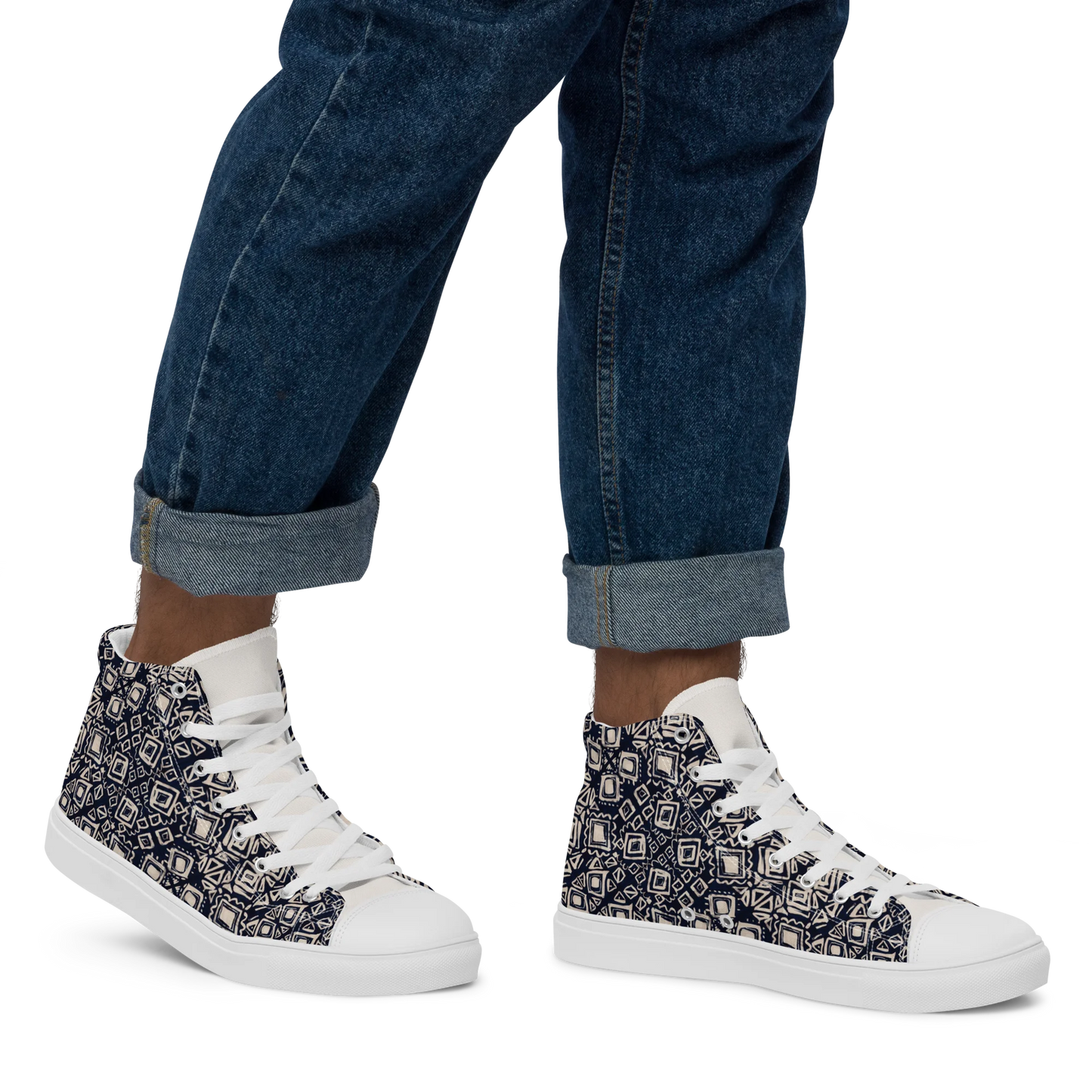 Made with a 100% polyester canvas upper, faux leather toe cap, breathable lining, removable insole, padded collar, lace-up front, and EVA rubber outsole. Designed with white soles and matching white laces. Finished with an all-over black and beige geometric sublimation print on the shoe quarters, plus custom branding on the tongue and inside label