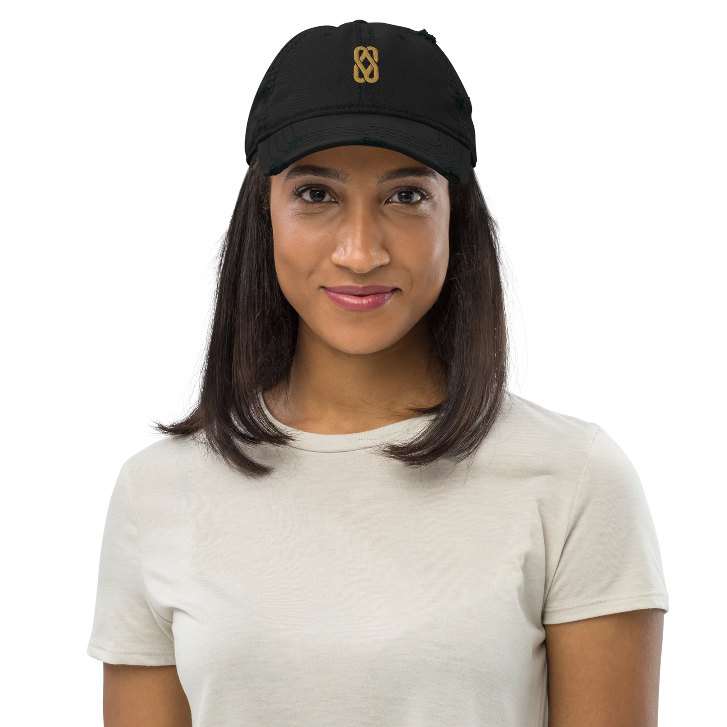 Made from 100% pre-shrunk cotton twill. Designed as an unstructured 6-panel cap with a low profile, soft crown, curved visor, six sewn eyelets, four stitched rows on the visor, seamed front panel without buckram, and adjustable hook-and-loop closure. The crown and visor feature distressed fabric detailing for a worn-in appearance. Finished with Old Gold Solstice Loop embroidery on the front.