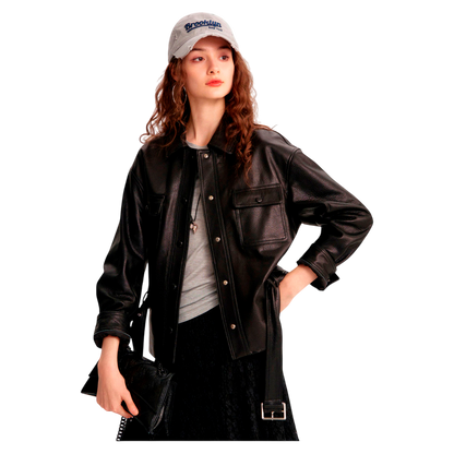 Person wearing a black leather jacket and gray cap on a white background