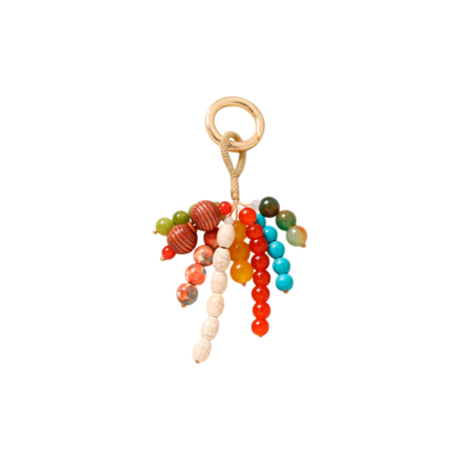 Colorful beaded keychain with a gold ring on a white background
