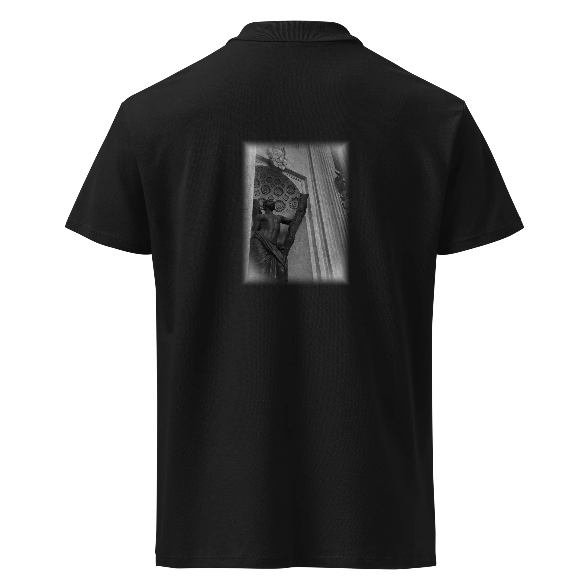 Made from 100% combed ring-spun cotton pique. Fabric weight: 6.2 oz/yd² (210 g/m²). Designed with a regular fit, ribbed collar, tone-on-tone 3-button placket, straight hem with side slits, and a spare button on the inside seam. Finished with a large monochrome DTFlex architecture print on the back.