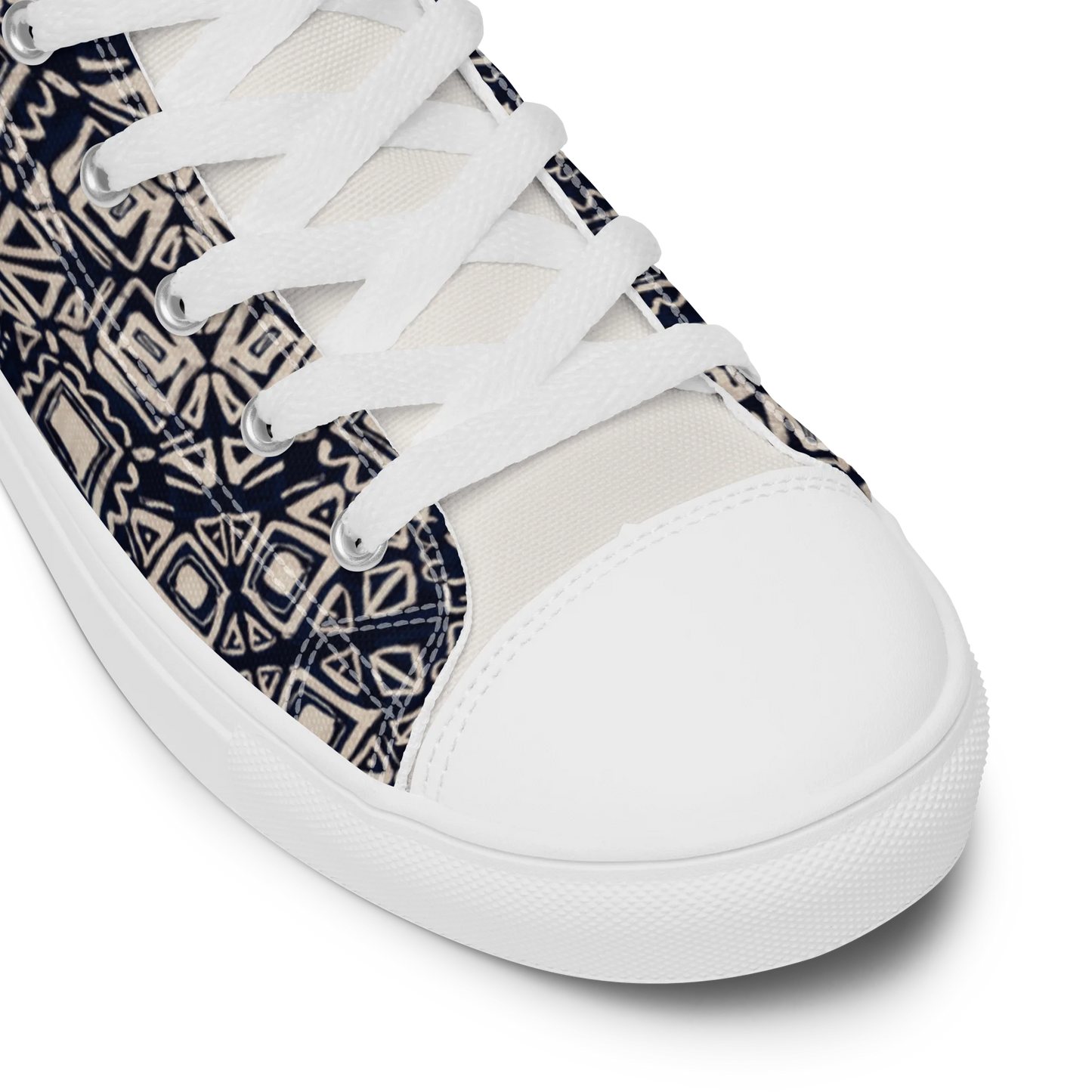 Made with a 100% polyester canvas upper, faux leather toe cap, breathable lining, removable insole, padded collar, lace-up front, and EVA rubber outsole. Designed with white soles and matching white laces. Finished with an all-over black and beige geometric sublimation print on the shoe quarters, plus custom branding on the tongue and inside label