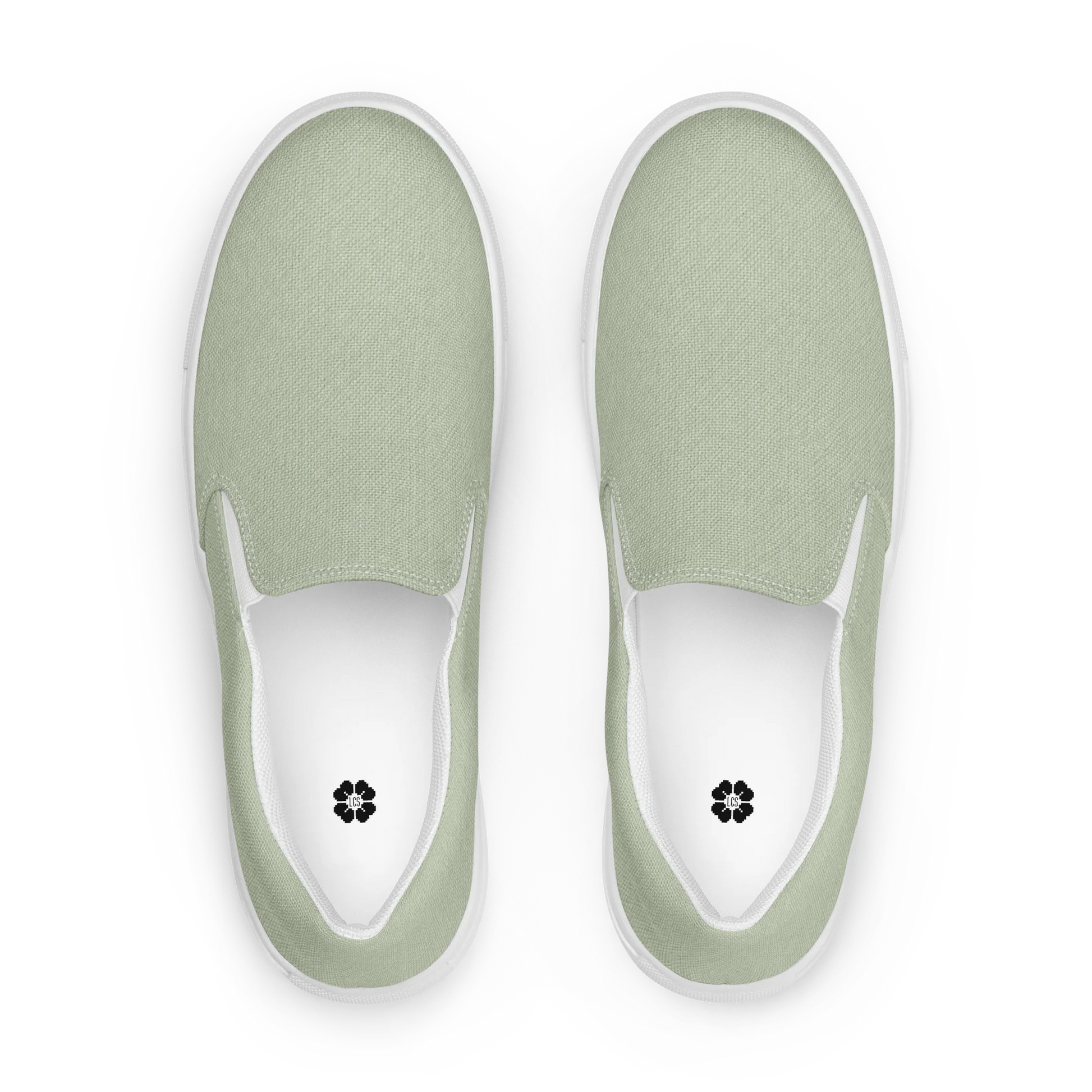 Made with a 100% polyester canvas upper, breathable lining, soft removable insole, elastic side accents, padded collar and tongue, and an EVA rubber outsole. Designed with a white sole and an easy slip-on silhouette. Finished with an all-over soft sage sublimation print that recreates the appearance of a subtle washed-fabric grain.