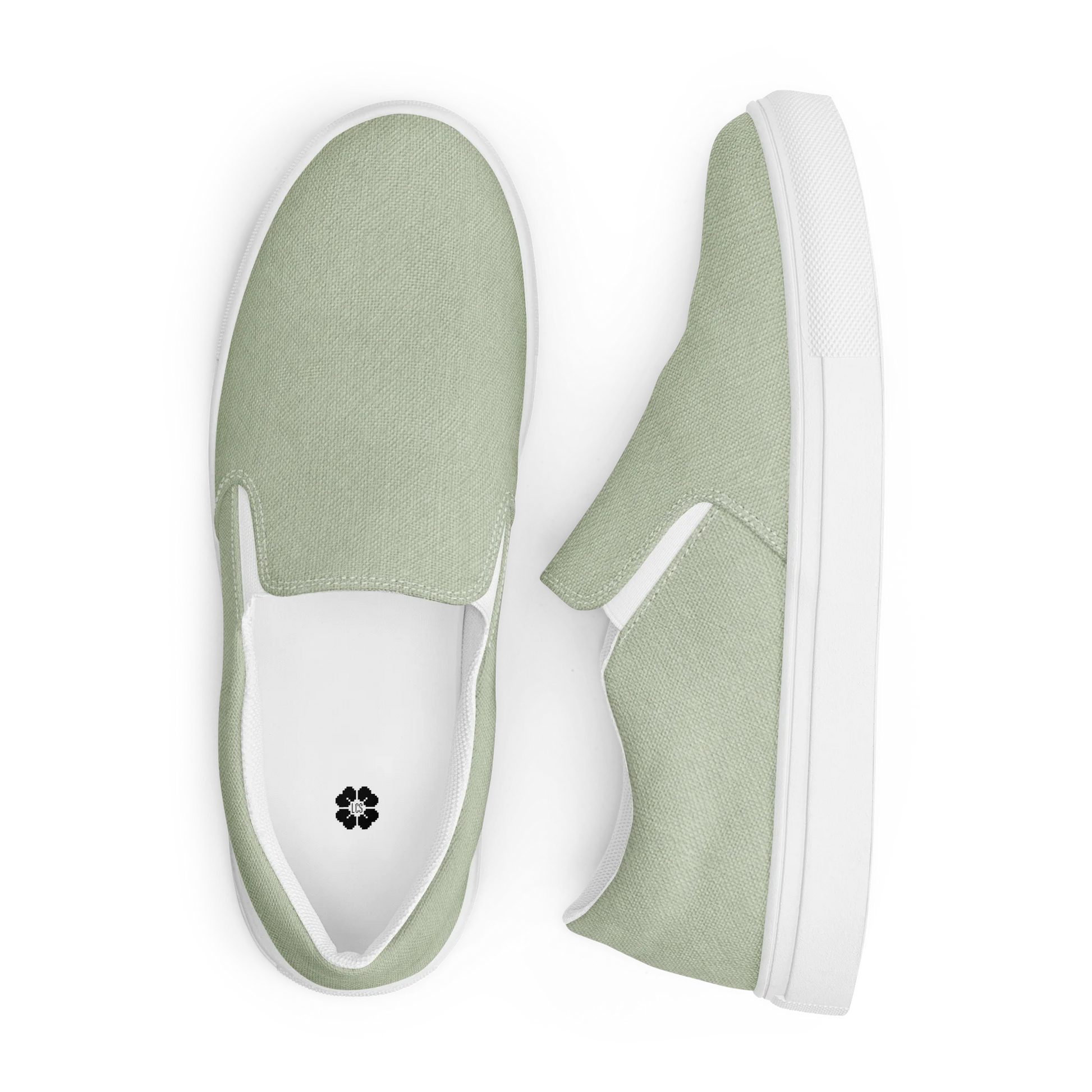 Made with a 100% polyester canvas upper, breathable lining, soft removable insole, elastic side accents, padded collar and tongue, and an EVA rubber outsole. Designed with a white sole and an easy slip-on silhouette. Finished with an all-over soft sage sublimation print that recreates the appearance of a subtle washed-fabric grain.