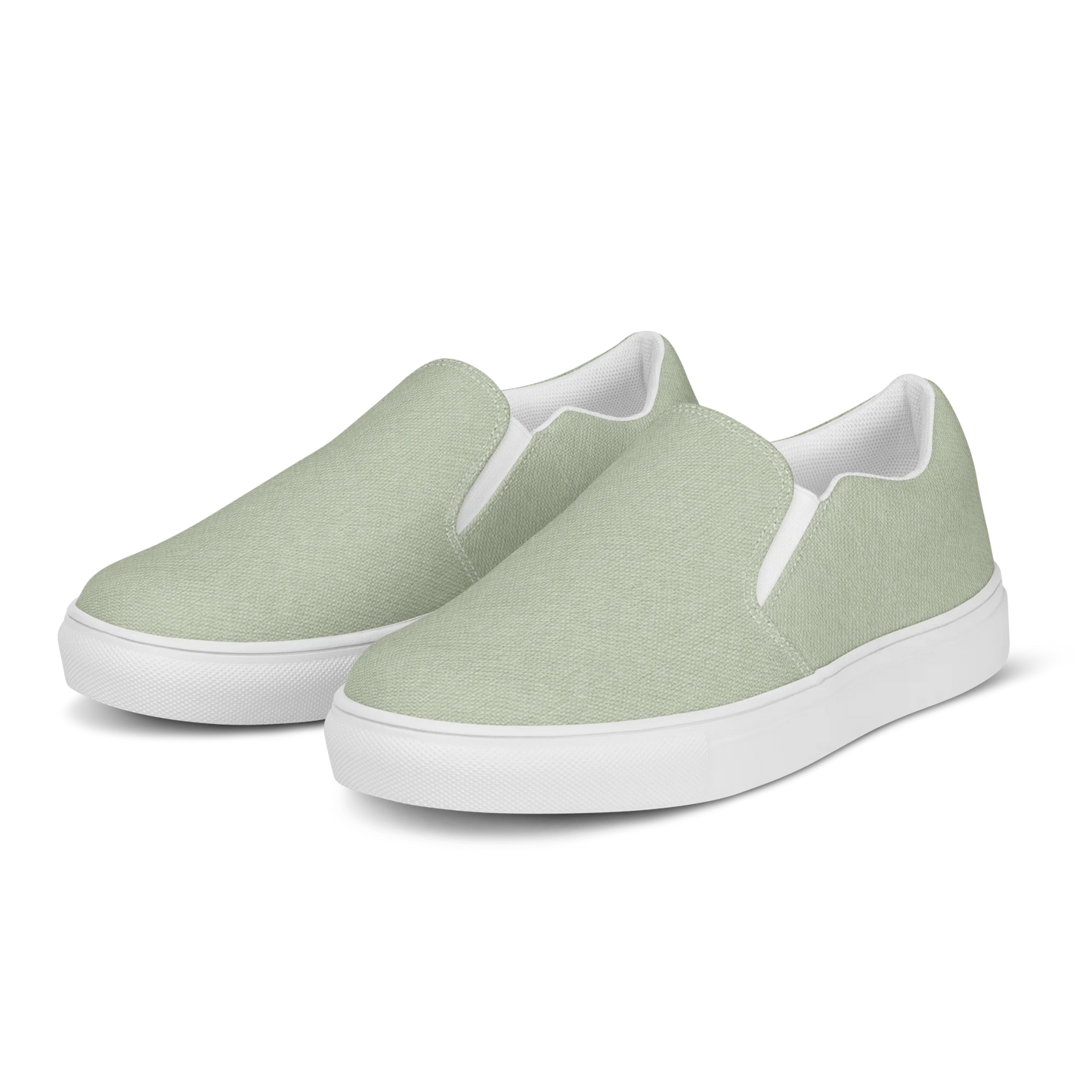 Made with a 100% polyester canvas upper, breathable lining, soft removable insole, elastic side accents, padded collar and tongue, and an EVA rubber outsole. Designed with a white sole and an easy slip-on silhouette. Finished with an all-over soft sage sublimation print that recreates the appearance of a subtle washed-fabric grain.