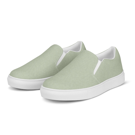 Made with a 100% polyester canvas upper, breathable lining, soft removable insole, elastic side accents, padded collar and tongue, and an EVA rubber outsole. Designed with a white sole and an easy slip-on silhouette. Finished with an all-over soft sage sublimation print that recreates the appearance of a subtle washed-fabric grain.