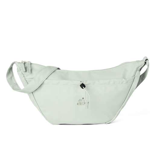 Made from 100% recycled polyester fabric. Designed in one size with a 12-liter capacity, water-repellent fabric, two-way zippered opening, external front pocket with cord adjuster, two internal padded slip pockets, and a self-fabric adjustable shoulder strap. Finished with a small front DTFlex travel icon print.
