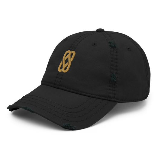 Made from 100% pre-shrunk cotton twill. Designed as an unstructured 6-panel cap with a low profile, soft crown, curved visor, six sewn eyelets, four stitched rows on the visor, seamed front panel without buckram, and adjustable hook-and-loop closure. The crown and visor feature distressed fabric detailing for a worn-in appearance. Finished with Old Gold Solstice Loop embroidery on the front.