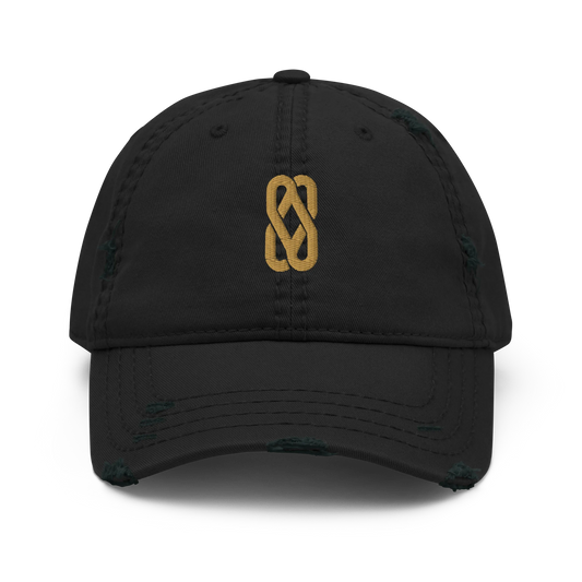 Made from 100% pre-shrunk cotton twill. Designed as an unstructured 6-panel cap with a low profile, soft crown, curved visor, six sewn eyelets, four stitched rows on the visor, seamed front panel without buckram, and adjustable hook-and-loop closure. The crown and visor feature distressed fabric detailing for a worn-in appearance. Finished with Old Gold Solstice Loop embroidery on the front.
