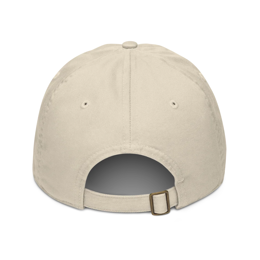 Made from 100% organic cotton in 3/1 twill. Fabric weight: 8 oz/yd² (271 g/m²). Designed as an unstructured 6-panel cap with a low profile, curved visor, matching sewn eyelets, and a self-fabric adjustable closure with a brass slider and hidden tuck-in. Finished with a muted green four-leaf clover print on the front.