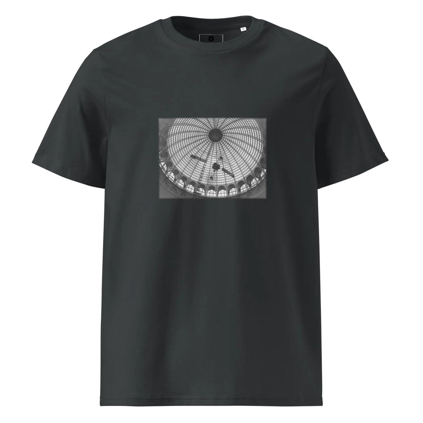 Made from 100% organic combed ring-spun cotton. Fabric weight: 5.3 oz/yd² (180 g/m²). Designed with a regular fit, set-in sleeves, 1×1 ribbed collar, double-needle topstitching on the sleeves and bottom hem, and self-fabric neck tape inside the back. Finished with a front DTG architectural print and a custom inside label.