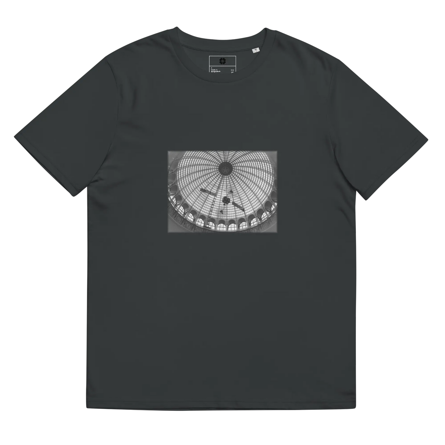 Made from 100% organic combed ring-spun cotton. Fabric weight: 5.3 oz/yd² (180 g/m²). Designed with a regular fit, set-in sleeves, 1×1 ribbed collar, double-needle topstitching on the sleeves and bottom hem, and self-fabric neck tape inside the back. Finished with a front DTG architectural print and a custom inside label.