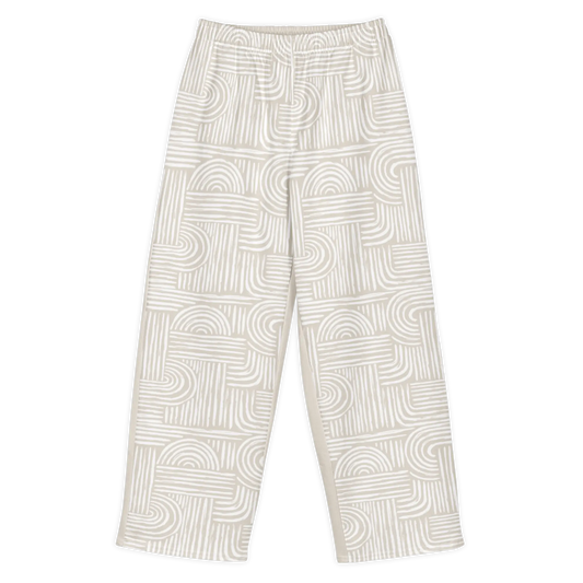 Made from 95% cotton and 5% elastane with a substantial fabric weight of 8.85 oz/yd² (300 g/m²). Designed with a relaxed unisex fit, wide legs, an elasticated waistband, and a medium-soft heavyweight feel. The front panels feature a warm ivory and white linear print, while the back remains solid warm ivory.