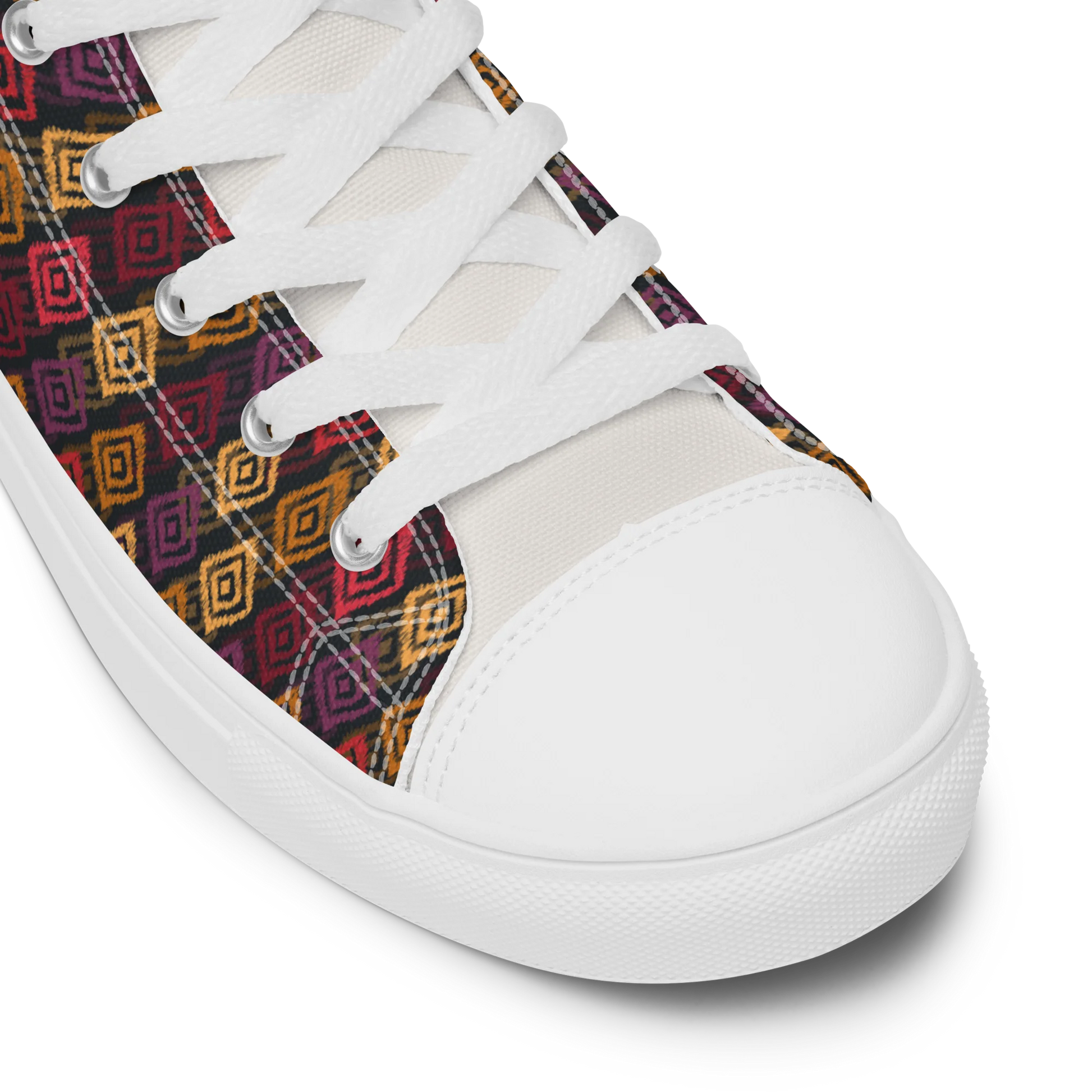Made with a 100% polyester canvas upper, faux leather toe cap, breathable lining, removable insole, padded collar, lace-up front, and EVA rubber outsole. Designed with white soles and matching white laces. Finished with an all-over multicolor diamond ikat-inspired mosaic sublimation print on the shoe quarters, plus custom branding on the removable insole and inside label.
