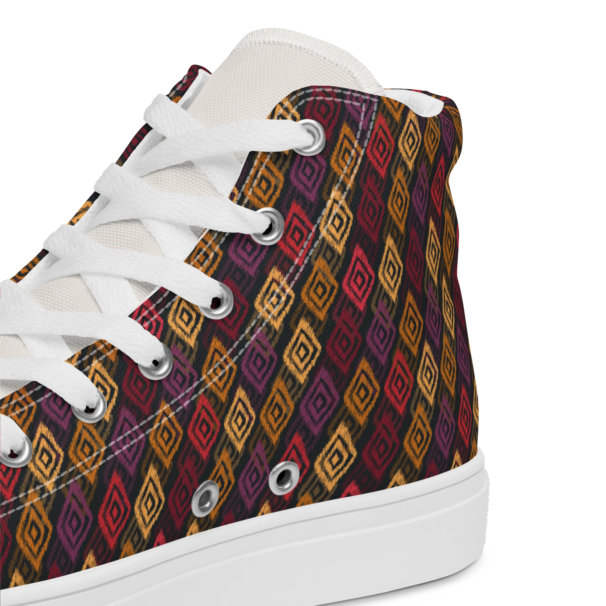 Made with a 100% polyester canvas upper, faux leather toe cap, breathable lining, removable insole, padded collar, lace-up front, and EVA rubber outsole. Designed with white soles and matching white laces. Finished with an all-over multicolor diamond ikat-inspired mosaic sublimation print on the shoe quarters, plus custom branding on the removable insole and inside label.