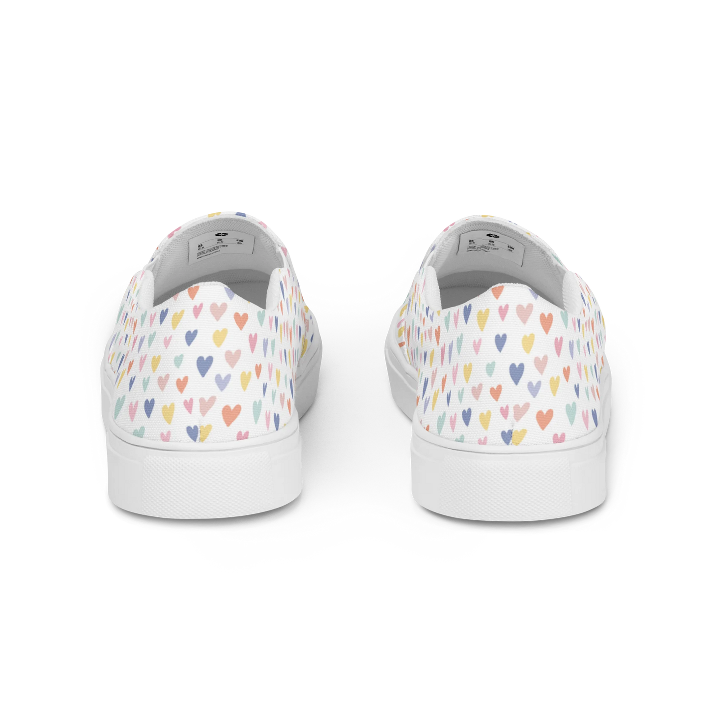 Made with a 100% polyester canvas upper, breathable lining, soft removable insole, elastic side accents, padded collar and tongue, and EVA rubber outsole. Designed with white soles and a slip-on silhouette. Finished with an all-over pastel hearts sublimation print.