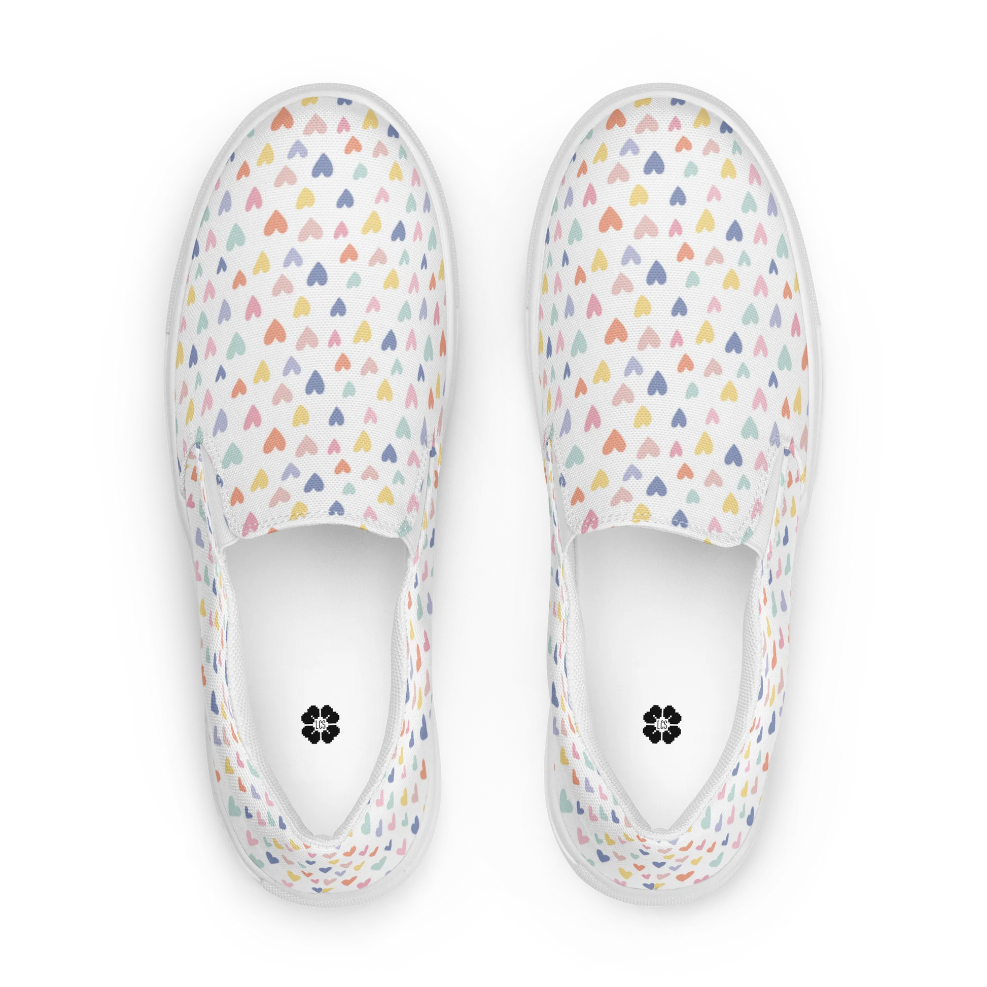 Made with a 100% polyester canvas upper, breathable lining, soft removable insole, elastic side accents, padded collar and tongue, and EVA rubber outsole. Designed with white soles and a slip-on silhouette. Finished with an all-over pastel hearts sublimation print.