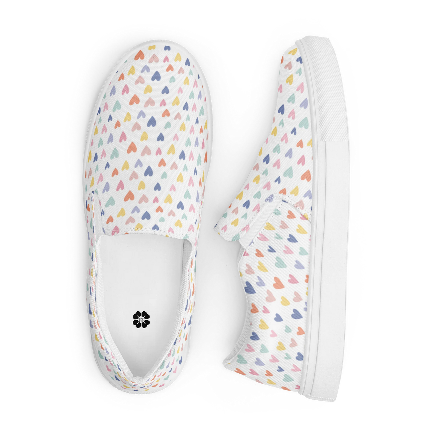 Made with a 100% polyester canvas upper, breathable lining, soft removable insole, elastic side accents, padded collar and tongue, and EVA rubber outsole. Designed with white soles and a slip-on silhouette. Finished with an all-over pastel hearts sublimation print.
