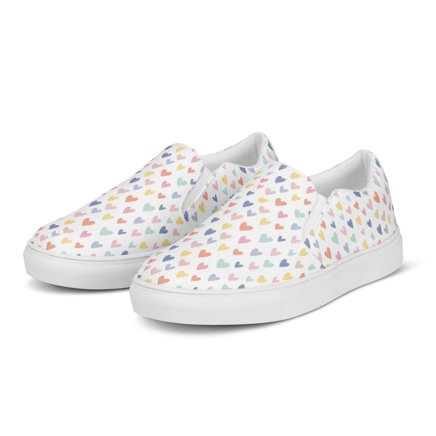 Made with a 100% polyester canvas upper, breathable lining, soft removable insole, elastic side accents, padded collar and tongue, and EVA rubber outsole. Designed with white soles and a slip-on silhouette. Finished with an all-over pastel hearts sublimation print.